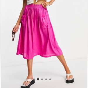 ASOS DESIGN midi skirt with pocket detail in pink